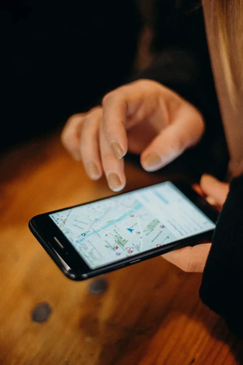 Customer searching for a local trade on a smartphone map app